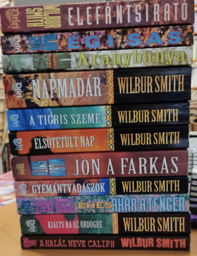 Wilbur Smith - 11 Wilbur Smith: Elefntsirat; gi sas; Aranybnya; Napmadr; A tigris szeme; Elsttlt nap; Jn a farkas; Gymntvadszok; hes, akr a tenger; Kilts r az rdgre; A hall nem Caliph