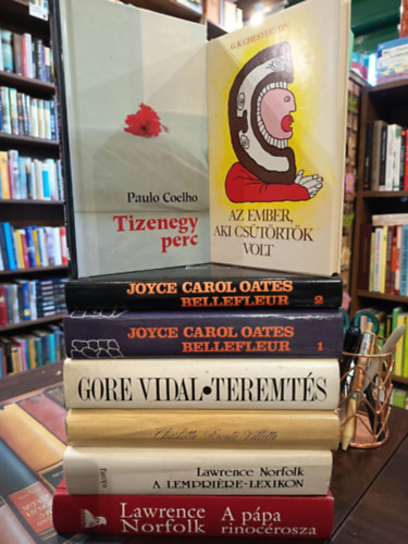 Chesterton G.K., Joyce Carol Oates, Gore Vidal, Charlotte Bront�, Lawrence Norfolk Paulo Coelho - Vil�girodalmi k�nyvcsomag 7 darabos K�NYVMENT� AJ�NLAT: Az ember, aki Cs�t�rt�k volt - R�m�lom, Tizenegy perc, Bellefleur avagy a csal�di �tok I-II., Teremt�s, Villette, A Lempri�re-lexikon, A p�pa rinoc�rosza